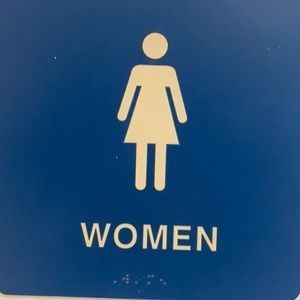 women’s bathroom sign